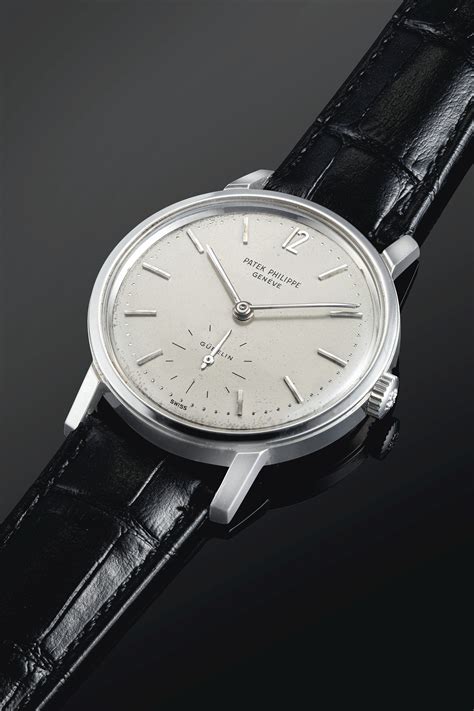 SIGNED PATEK PHILIPPE, GENÈVE, RETAILED BY GÜBELIN, 